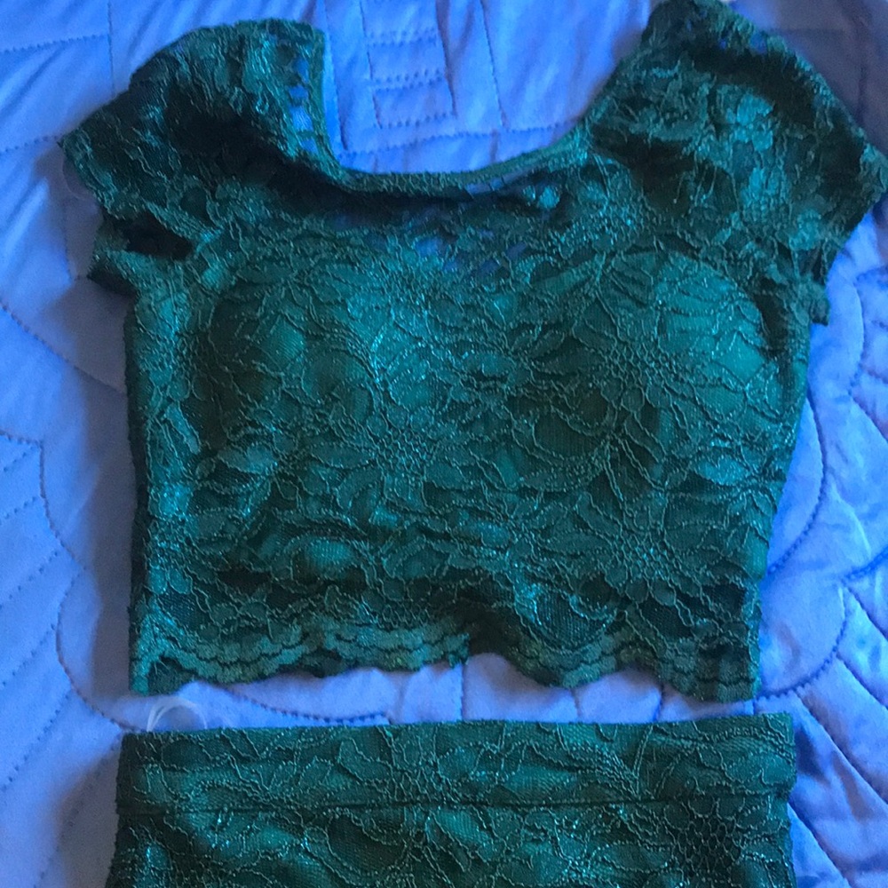 Emerald green tight dress.